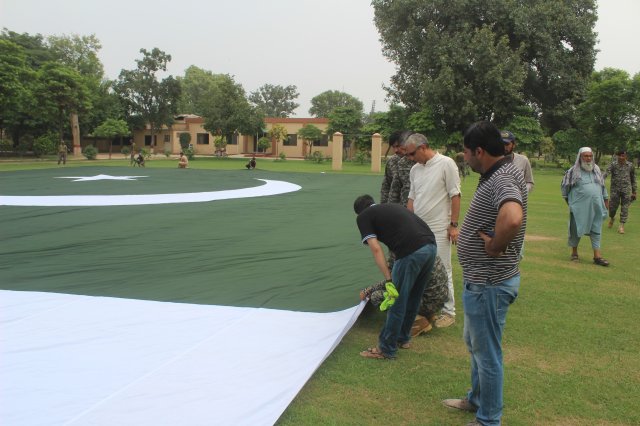 Flag manufacturing and hoisting